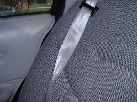1998 Ford Crown Victoria - Interior view of a car's seat and seatbelt, with a watermark indicating the source.