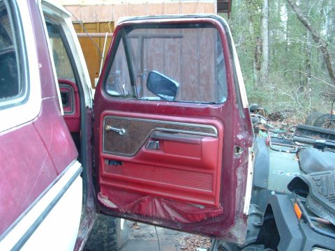 1979 Ford Bronco - Close-up of the driver's side interior door panel on a 1979 Ford Bronco.