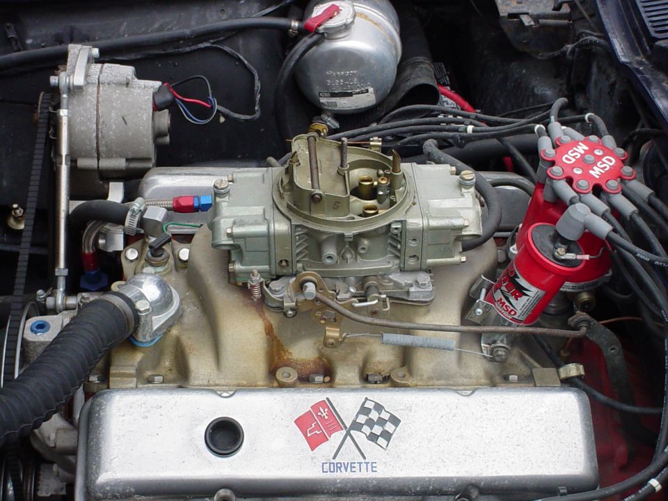 Corvette engine bay with carburetor and MSD ignition