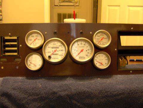 1978 Ford Bronco - Custom dashboard panel multiple gauges including tachometer, speedometer, fuel, oil, water, and voltage.