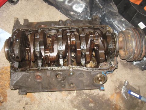 1988 Ford Bronco - Oil pan and pump taken off. Pan had a massive dent in it, so its pitched.