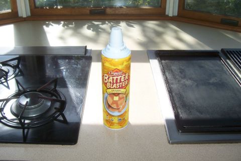 1994 Ford F-150 - A can of pancake batter sits on a kitchen counter between a stove and a griddle.
