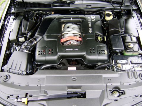 1996 Mercury Grand Marquis - The engine bay features a "MARK VIII" engine cover and "4.6L FOUR CAM V8" labeling.