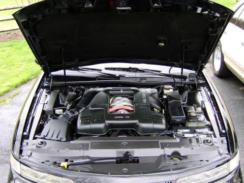 1996 Mercury Grand Marquis - Engine bay of a 1996 Mercury Grand Marquis, showing the 4.6L V8 engine.