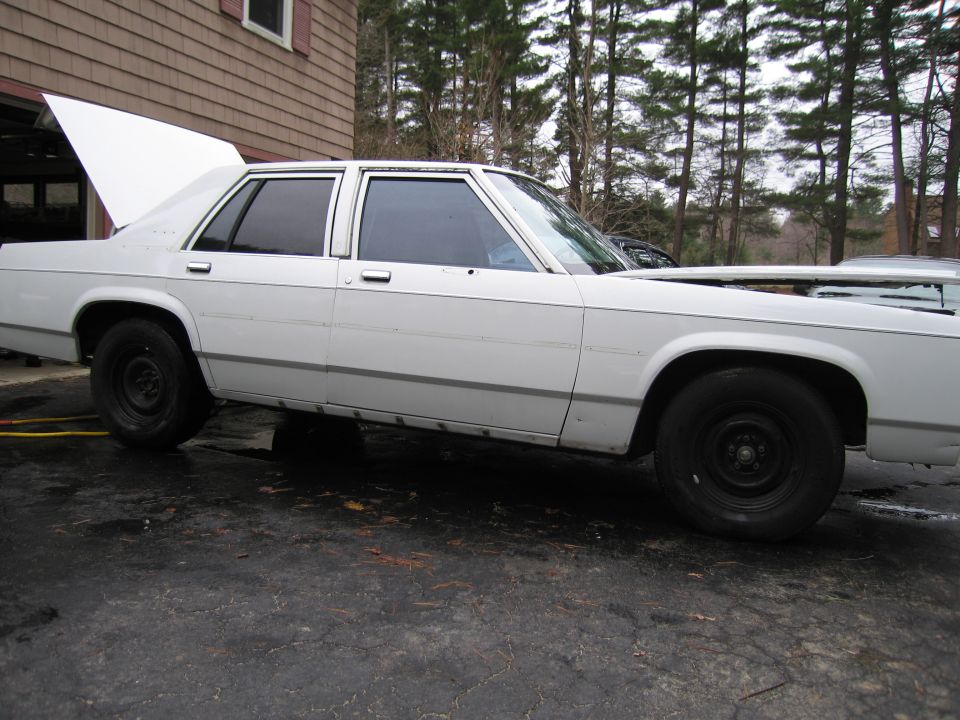 1991 Ford Crown Victoria LTD sedan, white, side view, trunk open
