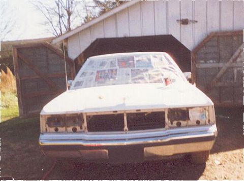 1991 Ford Crown Victoria - Front of the car last year. Here we are trying to fix the crack in the header panel (not to sucessful)