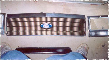 1991 Ford Crown Victoria - A Ford grille and headlight assembly are shown, possibly for a restoration project.