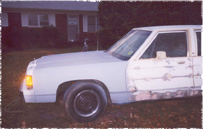 1991 Ford Crown Victoria - This 1991 Ford Crown Victoria is in the process of bodywork, with primer and filler applied.