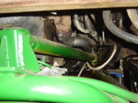 1992 Ford Bronco - Close-up of vehicle exhaust and suspension parts, with Supermotors.net logo.