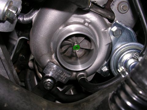 2007 Mazda 3 - Turbocharger assembly with part number K0422-991 visible on the tag.