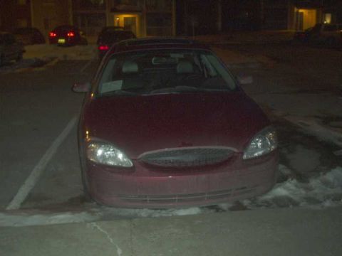 2000 Ford Taurus - the frond end at night. i washed her 2 days ago, but NE uses lots of salts on the road...