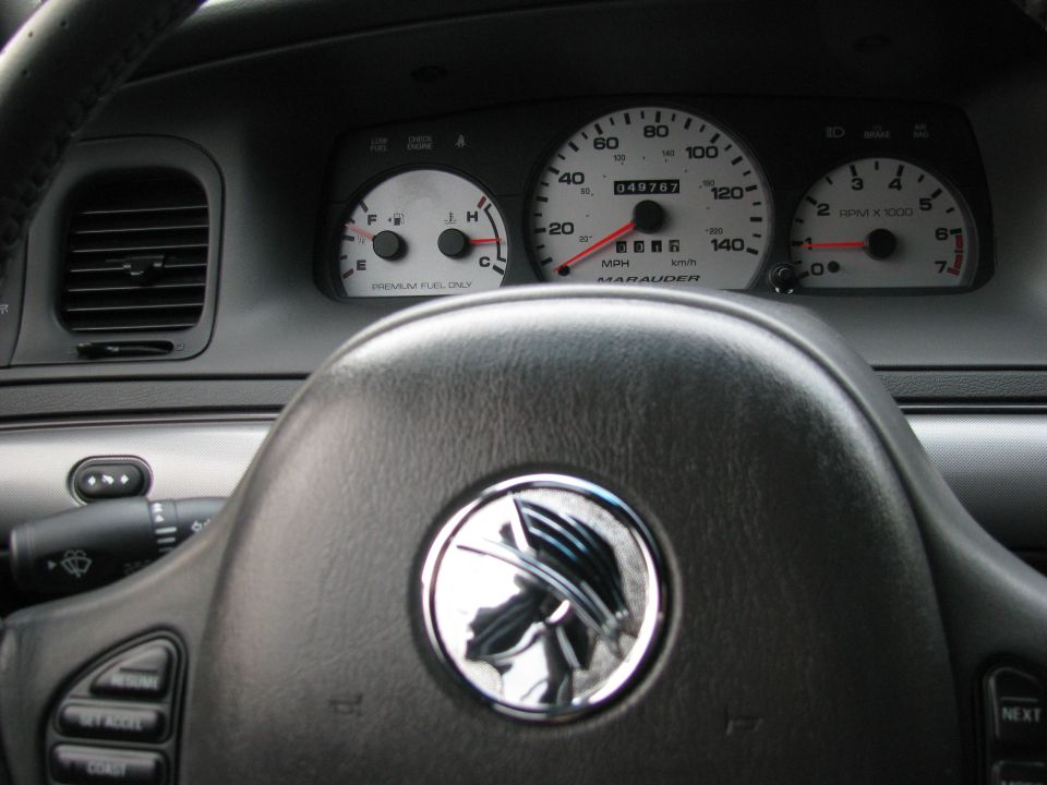 CAR Motorsports Godshead steering wheel emblem.