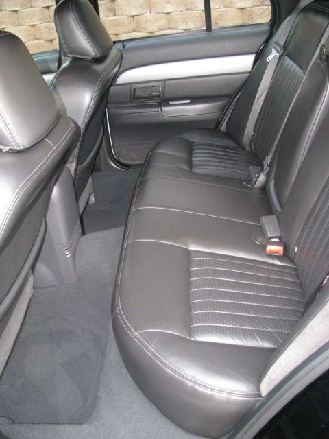 2003 Mercury Marauder - Interior view of the rear seats and door panel of a 2003 Mercury Marauder.