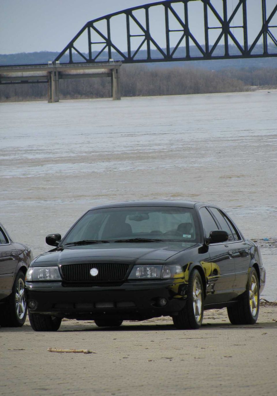 Black 2003 Mercury Marauder front view parked by water