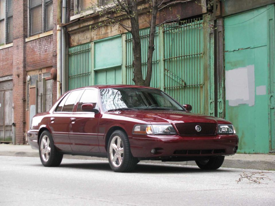 Red 2003 Mercury Marauder 3q-front view parked on street