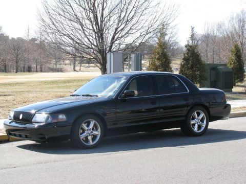 2003 Mercury Marauder - This black 2003 Mercury Marauder sedan is captured from a 3q front angle, its distinctive body style.