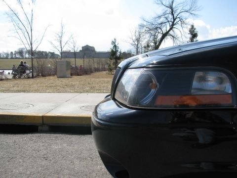 2003 Mercury Marauder - Close-up of the front corner of a black 2003 Mercury Marauder.