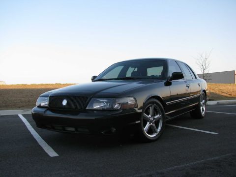 2003 Mercury Marauder - Black 2003 Mercury Marauder parked in a lot under a clear sky.