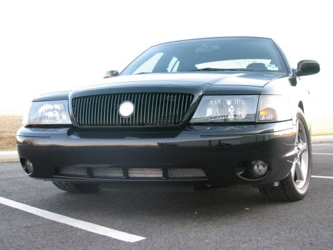 2003 Mercury Marauder - Front view of a black 2003 Mercury Marauder, highlighting its distinctive vertical grille and headlights.