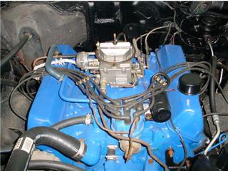 1972 Ford Ranchero - Close-up view of a vehicle's engine compartment, showing the motor and associated components.