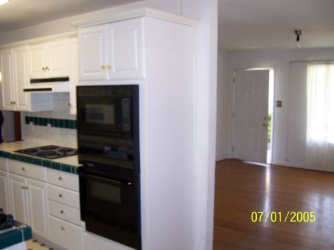 1991 Ford Bronco - Interior view of a kitchen with built-in appliances and a date stamp of 07/01/2005.