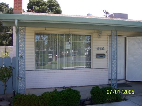 1991 Ford Bronco - Exterior view of a house with a date stamp indicating it was taken on July 1, 2005.