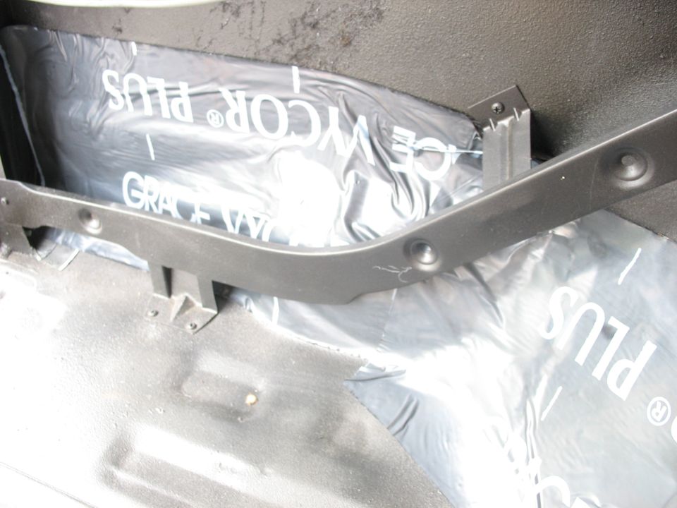 Interior view of waterproofing material with text 'GRACE VYCOR PLUS' under a dark gray trim piece