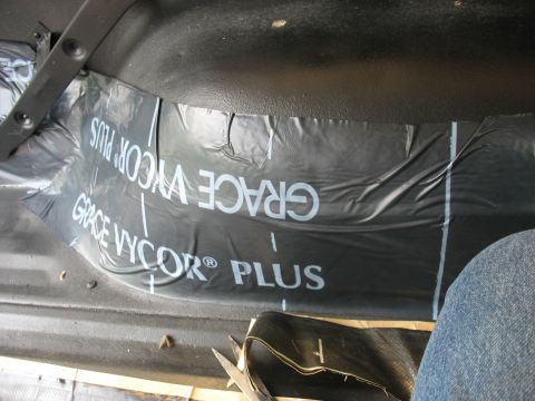1978 Ford Bronco - Soundproofing material is being installed inside a vehicle's interior.