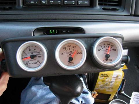 2003 Mercury Marauder - Dashboard with aftermarket Auto Meter boost, oil pressure, and voltage gauges installed.