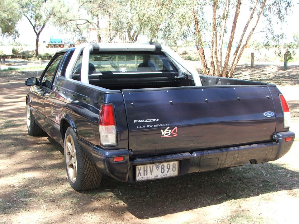 Rear of a dark blue Ford Falcon Longreach V8 ute