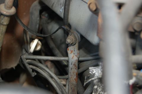 1989 Ford Bronco - Close-up view of the engine compartment, showing various mechanical components and wiring.