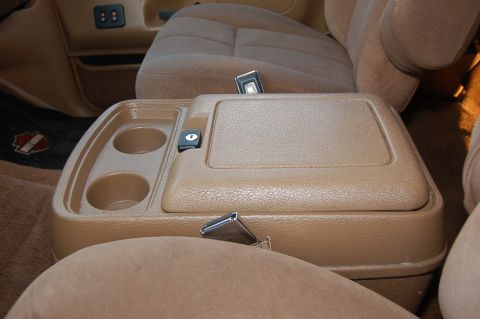 1989 Ford Bronco - Interior view of a 1989 Ford Bronco, showing the center console and seats.