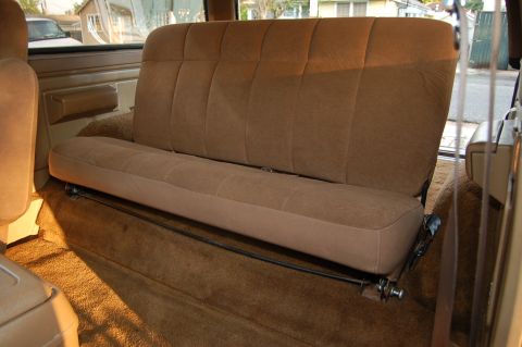 1989 Ford Bronco - The rear bench seat of a 1989 Ford Bronco is shown from the side.