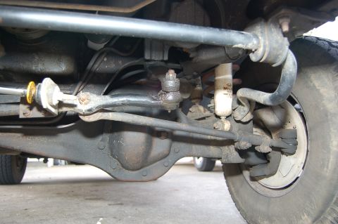 1989 Ford Bronco - Close-up view of a vehicle's suspension and drivetrain components.
