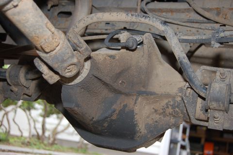1989 Ford Bronco - Close-up view of the rear differential and driveshaft components.