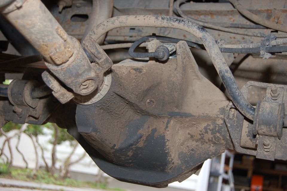 Rear differential and driveshaft assembly on a dirty vehicle