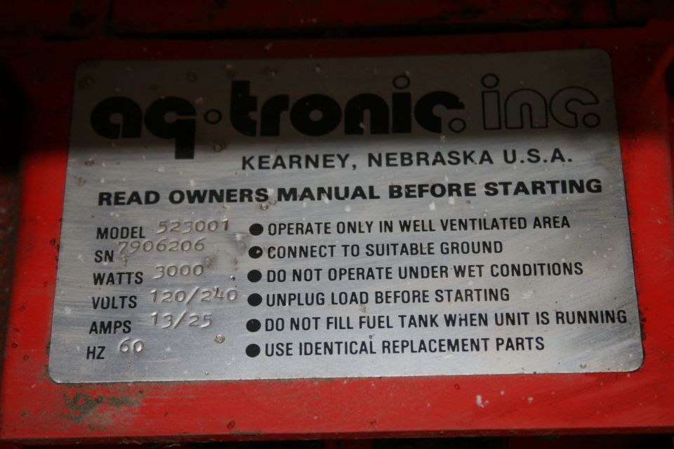 Ag-Tronic generator data nameplate with model, serial, watts, volts, amps