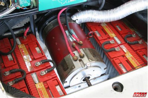 1991 Ford Bronco - Close-up view of an electric motor and multiple Odyssey Extreme Batteries.