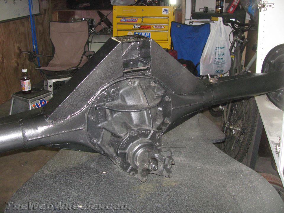 Black rear axle assembly with textured housing