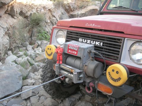 1974 Ford F-250 - This Suzuki Samurai is equipped with a winch and auxiliary lights, ready for off-road adventures.
