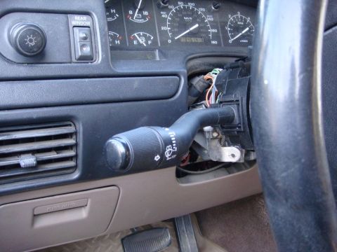 1996 Ford Bronco - Interior view of a 1996 Ford Bronco, showing the signal switch and dashboard gauges.