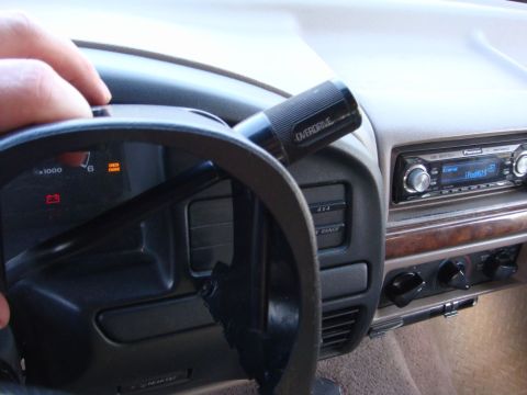 1996 Ford Bronco - Interior view of a vehicle's dashboard, showing the steering wheel, instrument cluster, and center console.