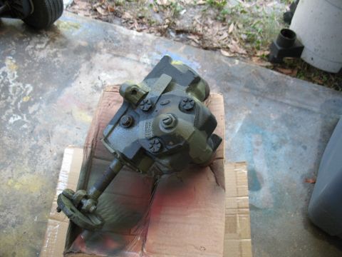 1985 Ford Crown Victoria LTD - A green steering gear box, possibly for a 1985 Ford Crown Victoria LTD, is shown resting on a cardboard box.
