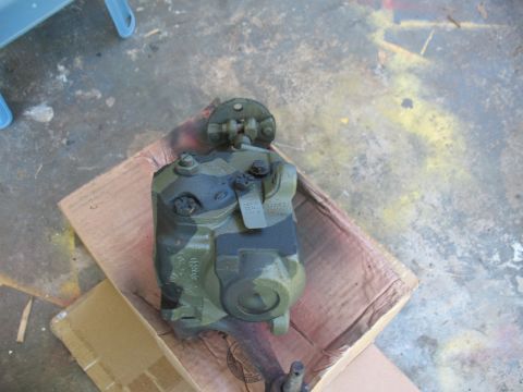 1985 Ford Crown Victoria LTD - A painted steering gear box sits on cardboard, showing some visible markings.