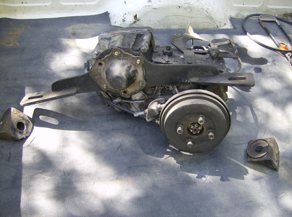 transfer case assembly with brake drum and mounting brackets