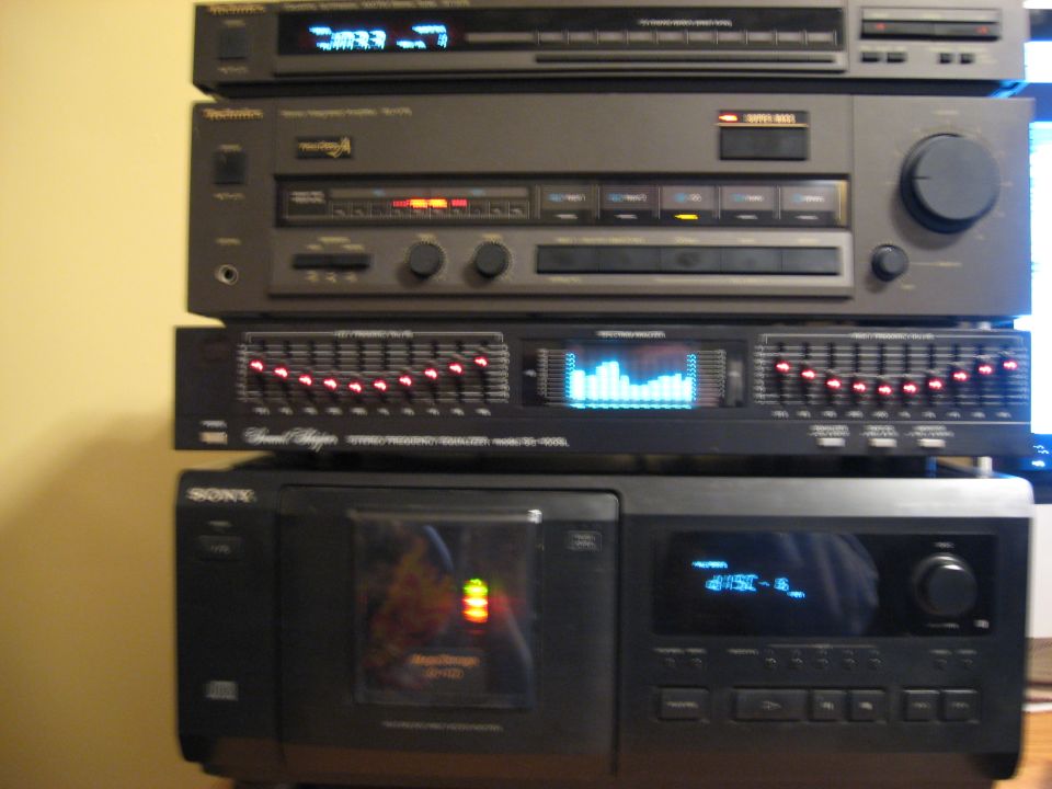 Stack of audio equipment including a Sony CD player and Technics components