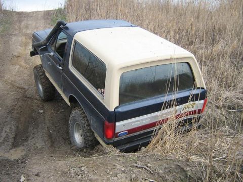 1990 Ford Bronco - This 1990 Ford Bronco navigates a muddy off-road trail with its snorkel engaged.