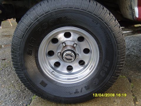 1989 Ford Bronco - Close-up of a tire and wheel assembly, likely from a truck or SUV.