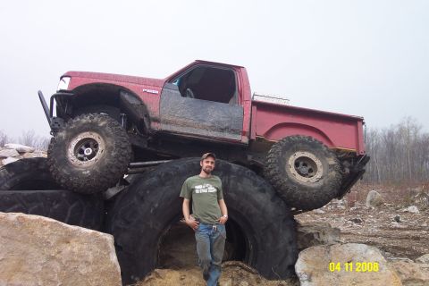 1992 Ford Bronco - This heavily modified 1992 Ford Bronco sits atop enormous tires, its off-road capabilities.