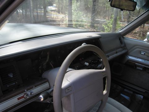 1991 Ford LTD Crown Victoria - Interior view of a 1991 Ford Crown Victoria LTD, focusing on the dashboard and steering wheel.